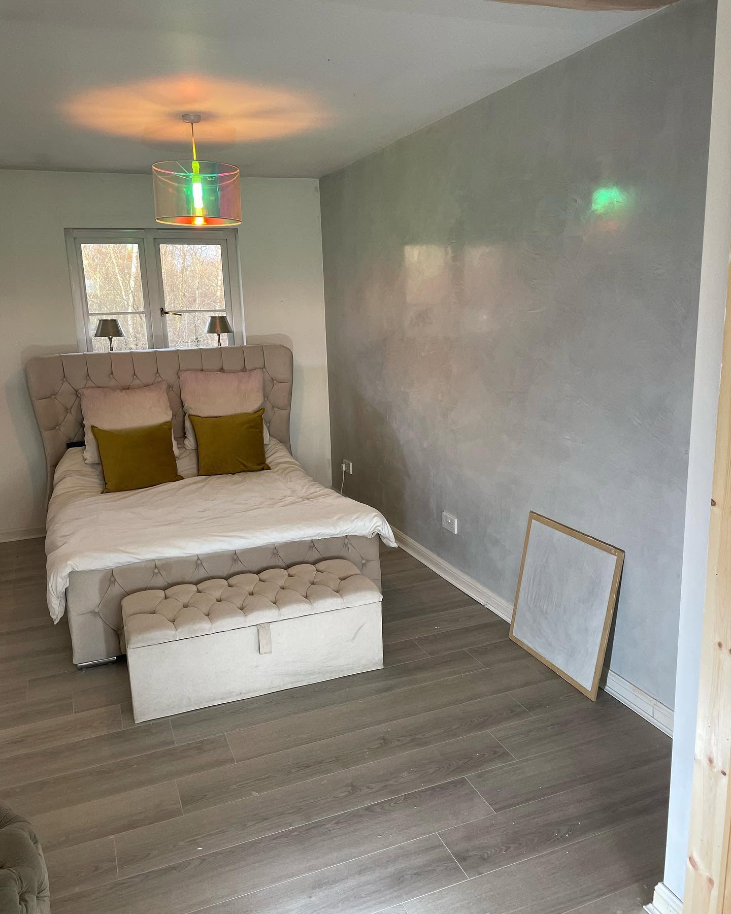 Bedroom with textured wall
